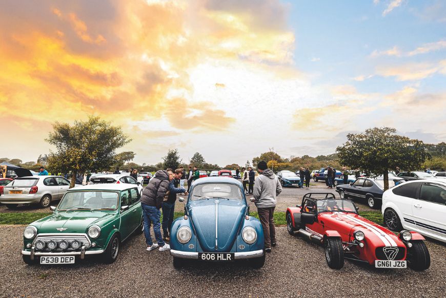 people looking at old cars